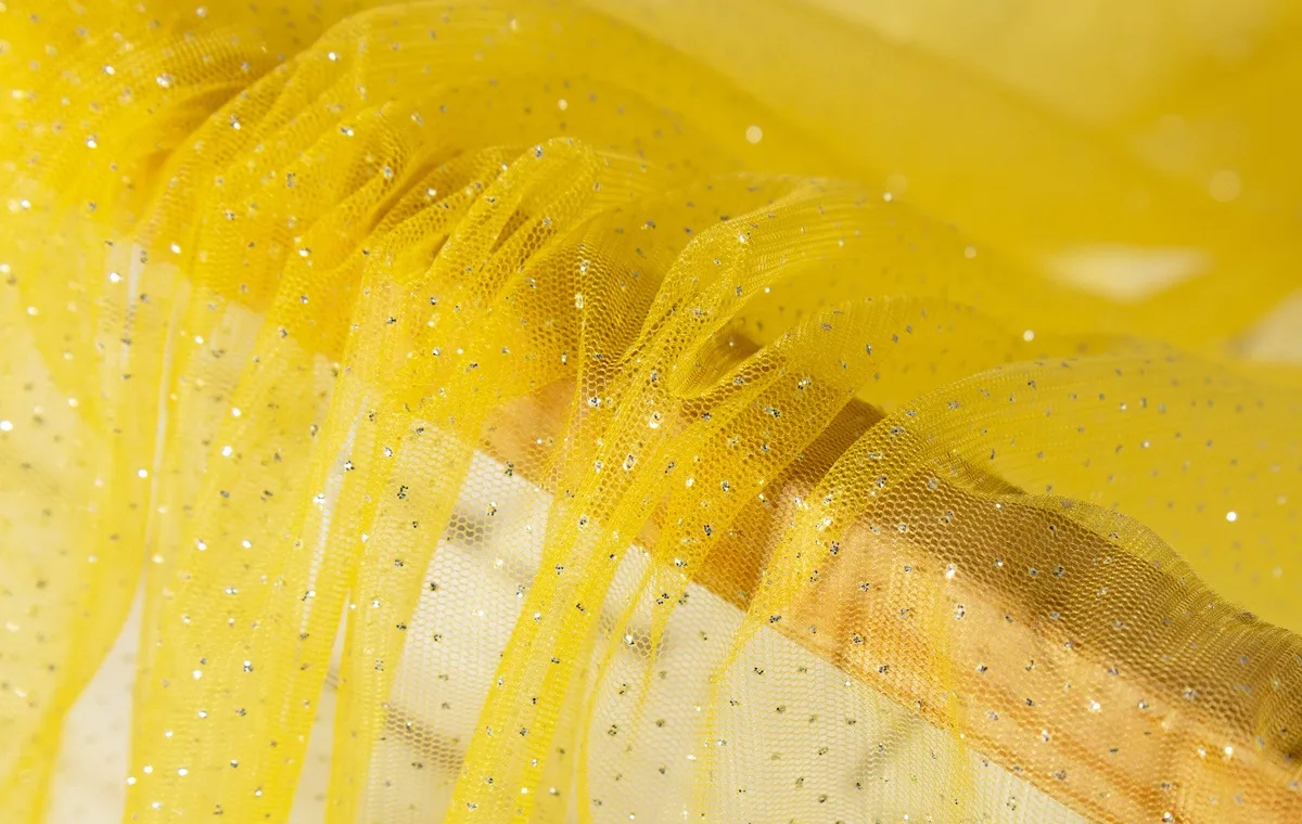 gold glitters glued yellow soft tulle
