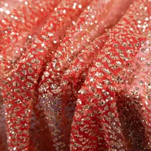 gold glitters glued on red mesh glitter fabric