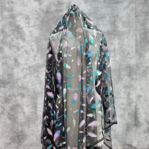 glistening colorful feather printed black tulle