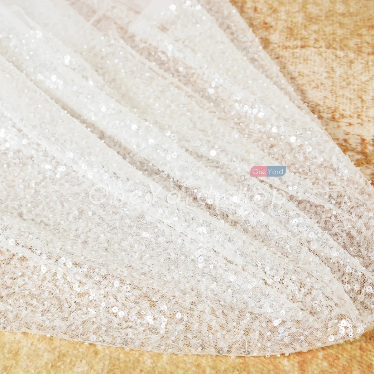 sparkly transparent sequins beads mixed over mesh glitter fabric