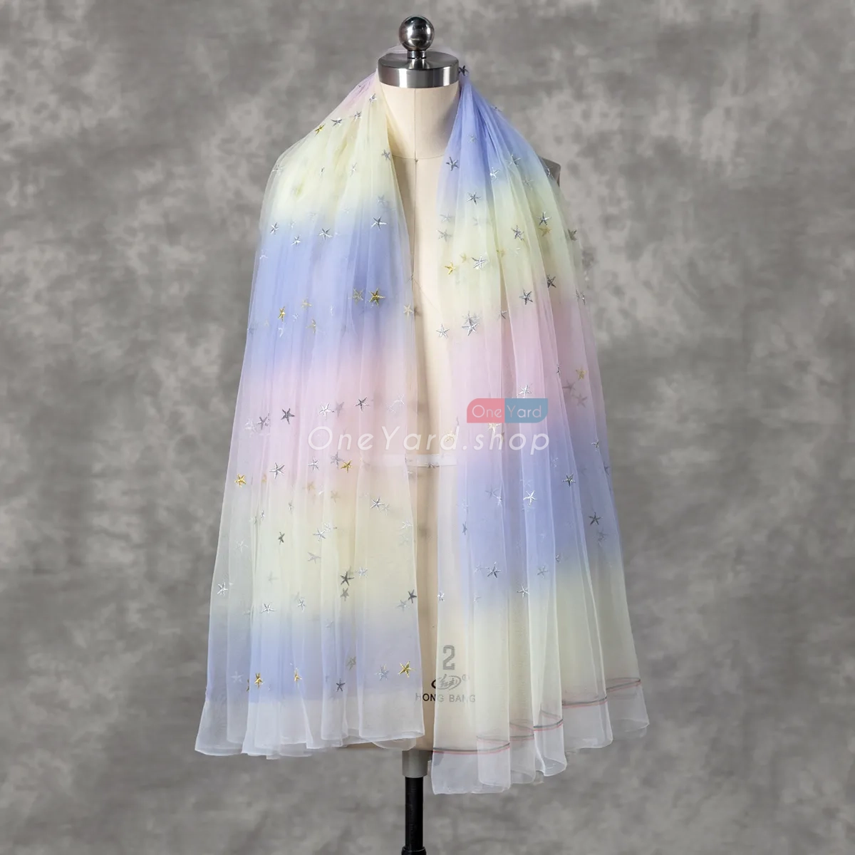 daffodil to blue to pink ombre tulle with stars embroidered daffodil to blue to pink ombre tulle with stars embroidered