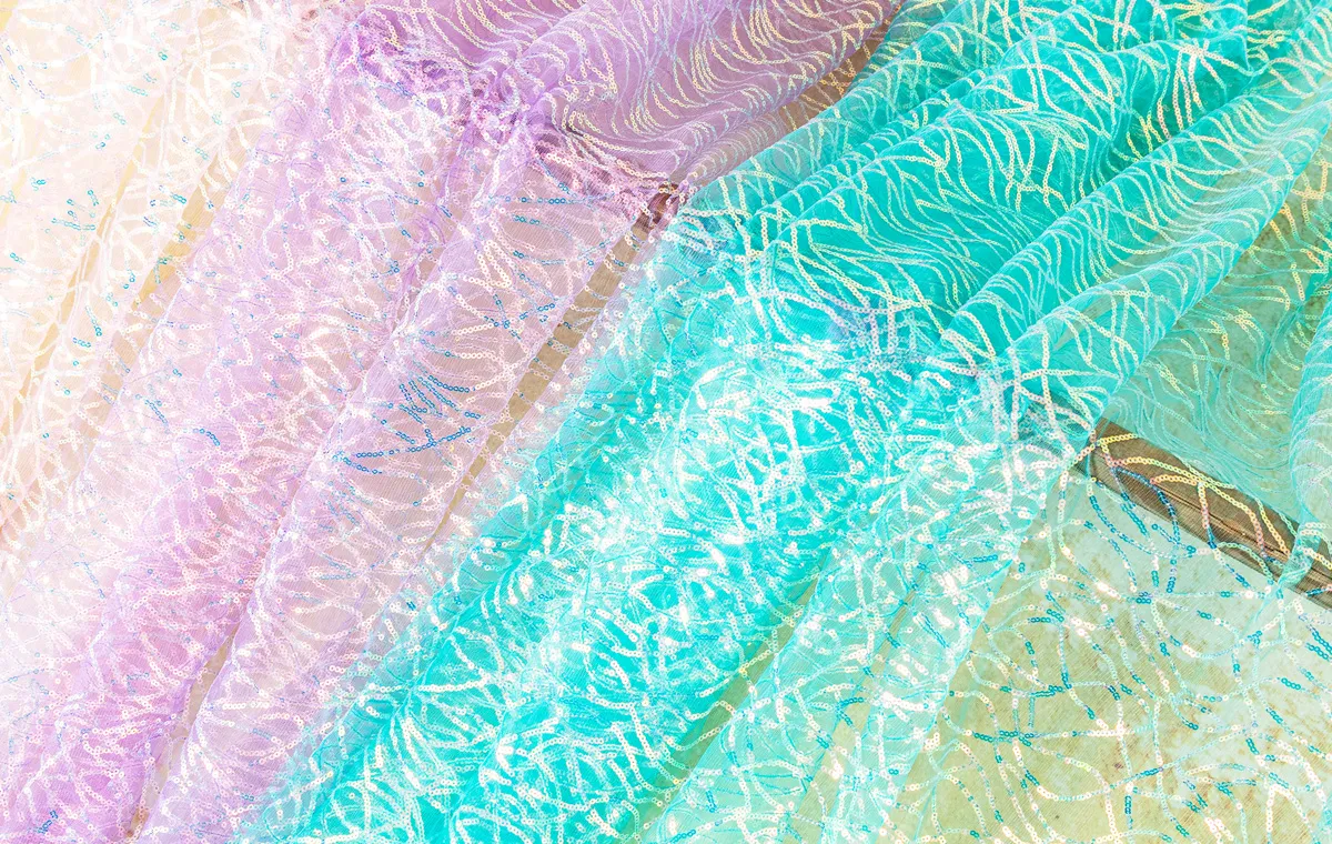 swirling wave iridescent sequin fabrics