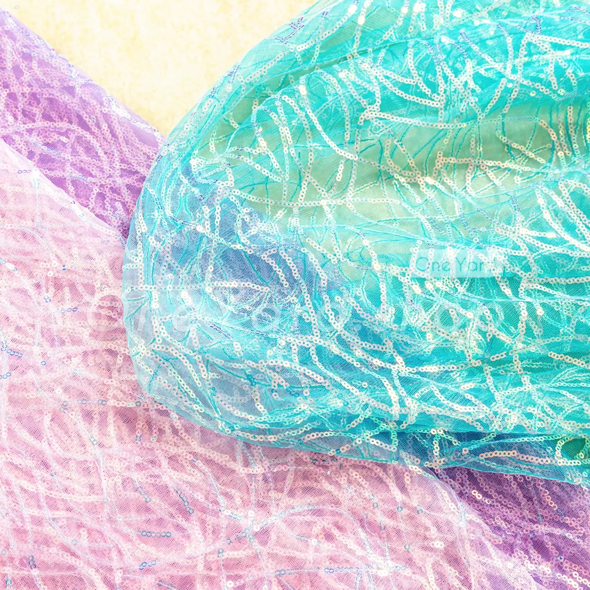 waves pattern iridescent sequin mesh fabric