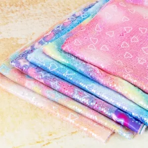 shiny clear sequinned star and heart printed satin fabric