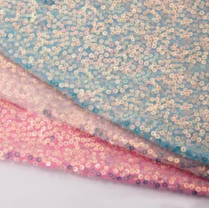 dazzling 3mm disc sequins densely packed on mesh fabric