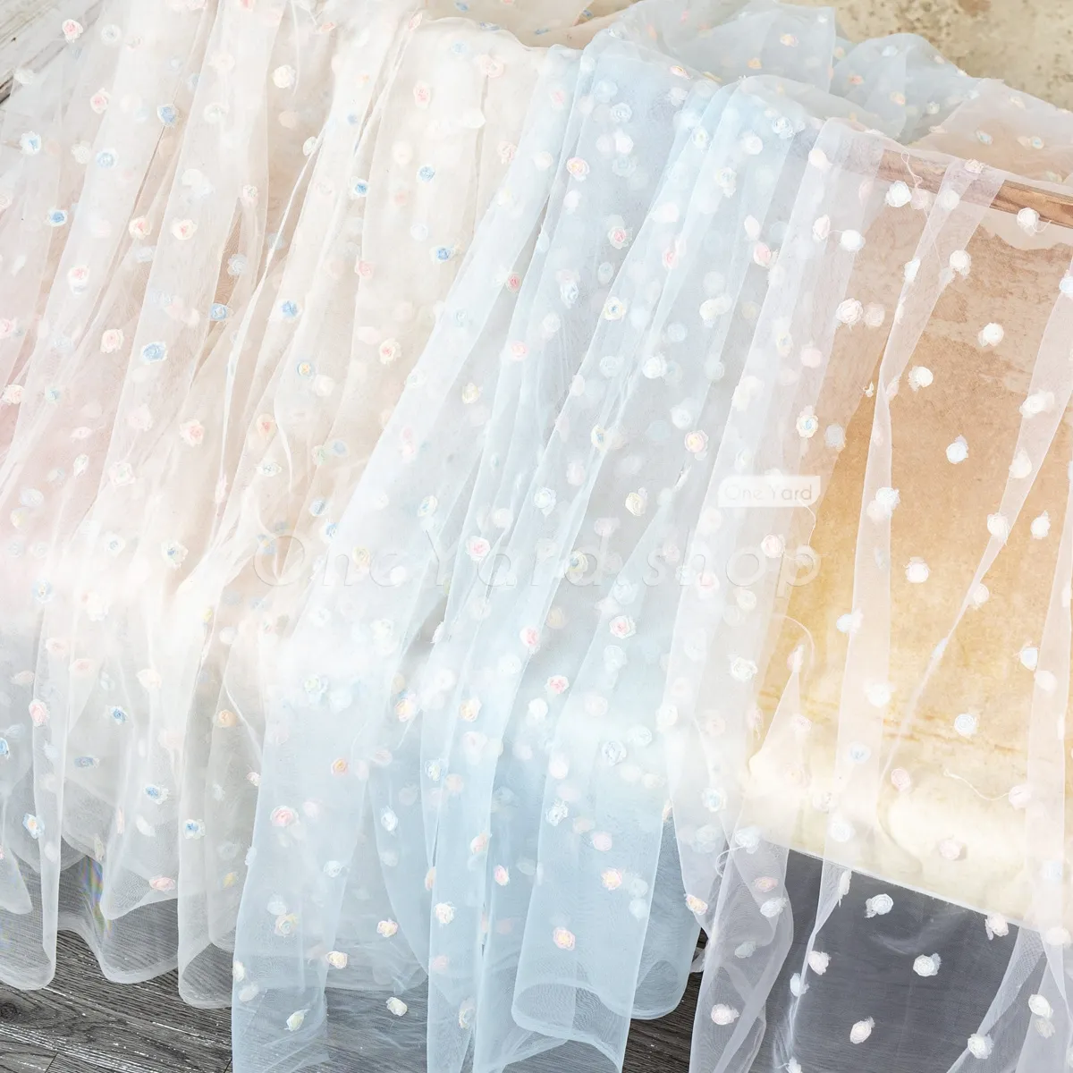 small multi colored rosette embroidery tulle