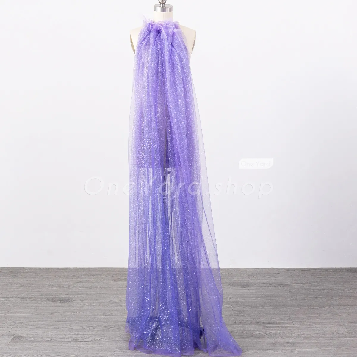 glitter glued bluish purple tulle fabric