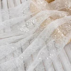 sparkly sequin beaded off white French lace fabric for sale
