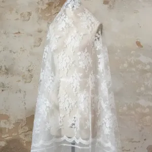 repeated independent floral chantilly lace bridal fabric