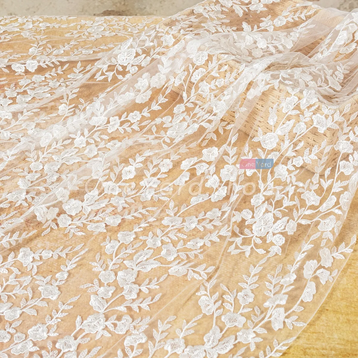 lace with delicate flowers and scrolling leaves