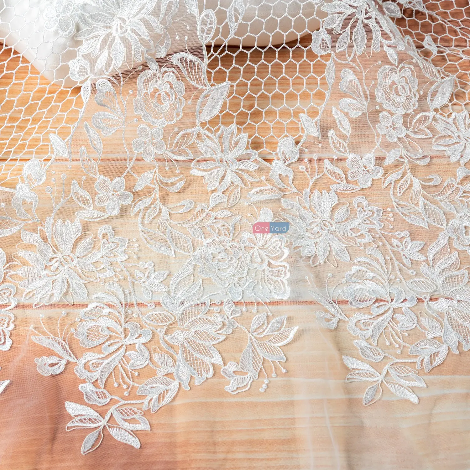 sequinned leaf floral pattern ivory white bridal lace fabric