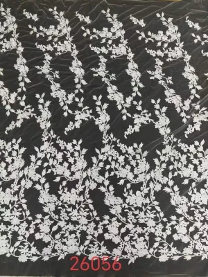 sprawling leaf vine pattern embroidered lace textile