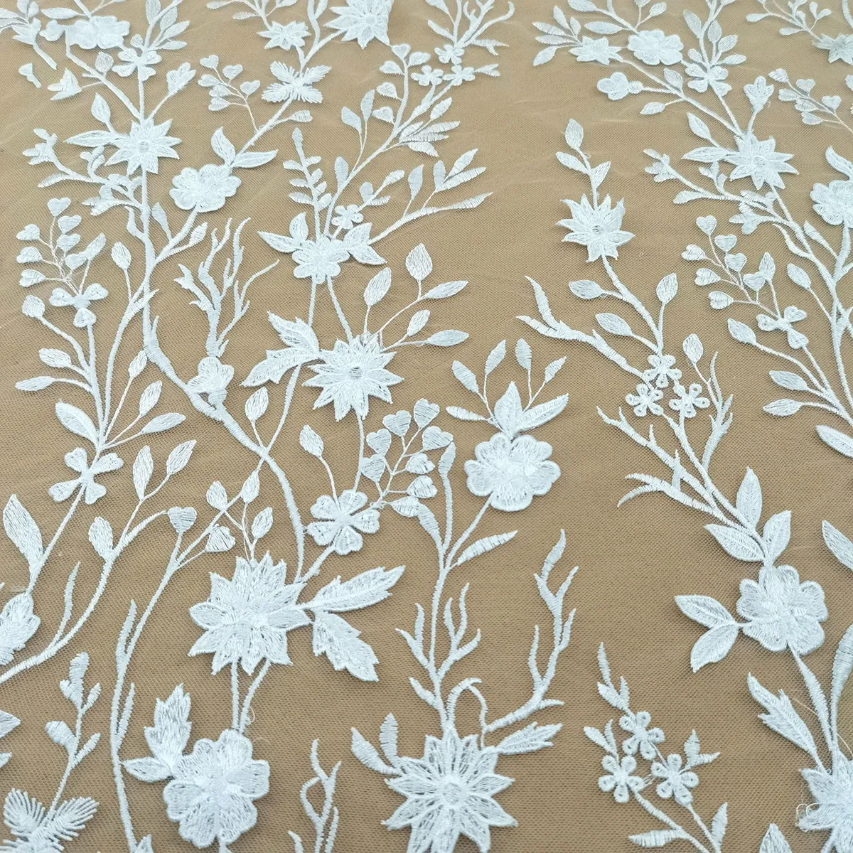 embroidered lace with winding botanical branches and blossoms embroidered lace with winding botanical branches and blossoms