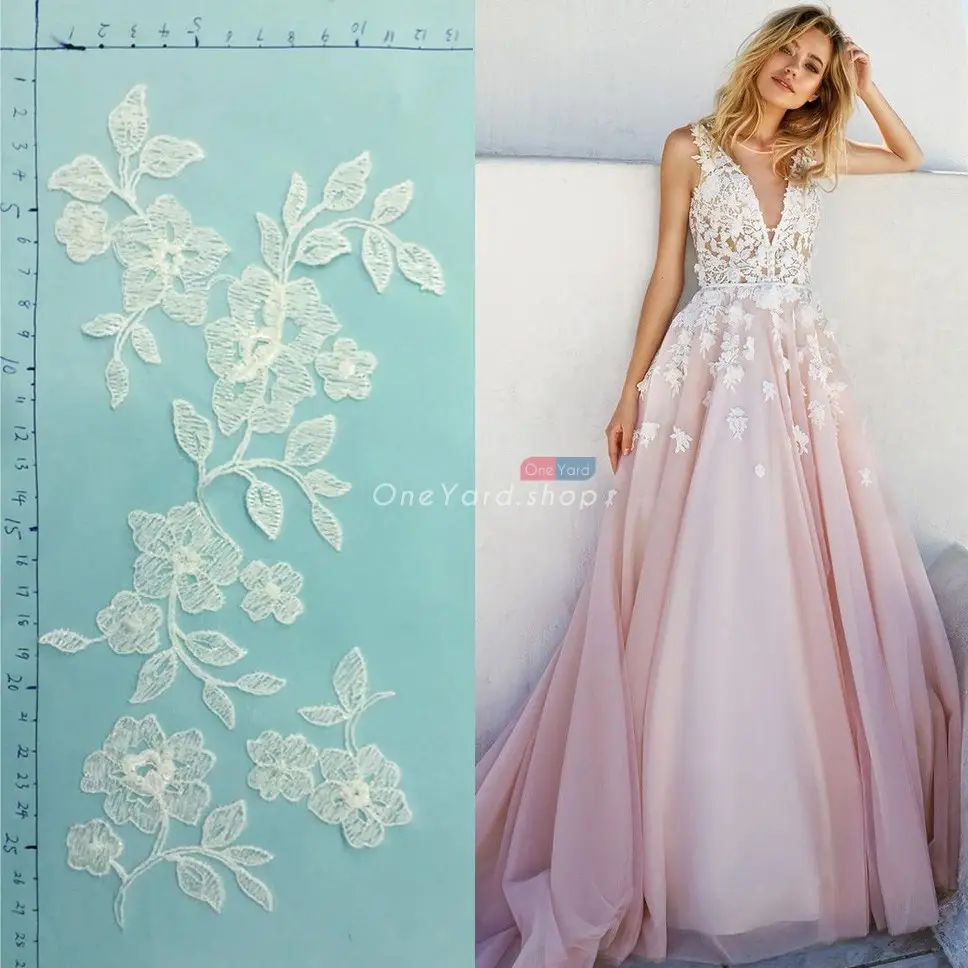 a pair of ivory floral leaf lace applique
