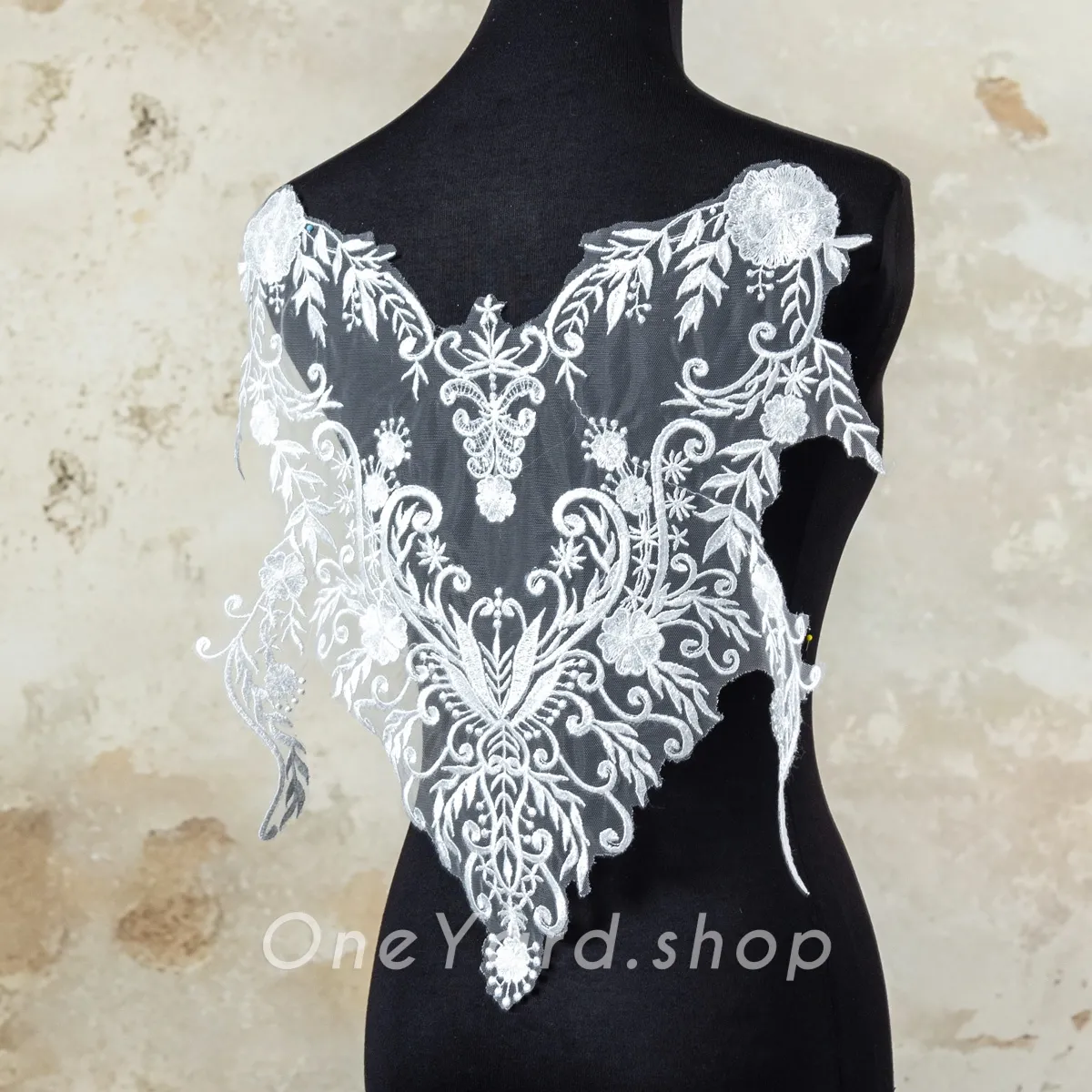 sequinned symmetrical lace applique