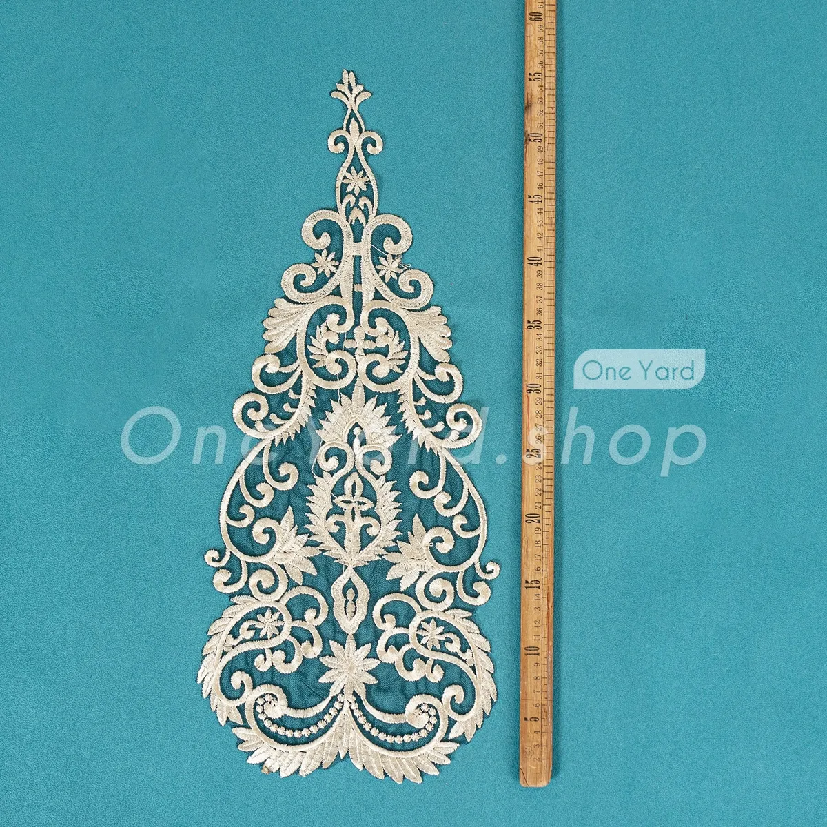 oversized light gold baroque motif on black mesh