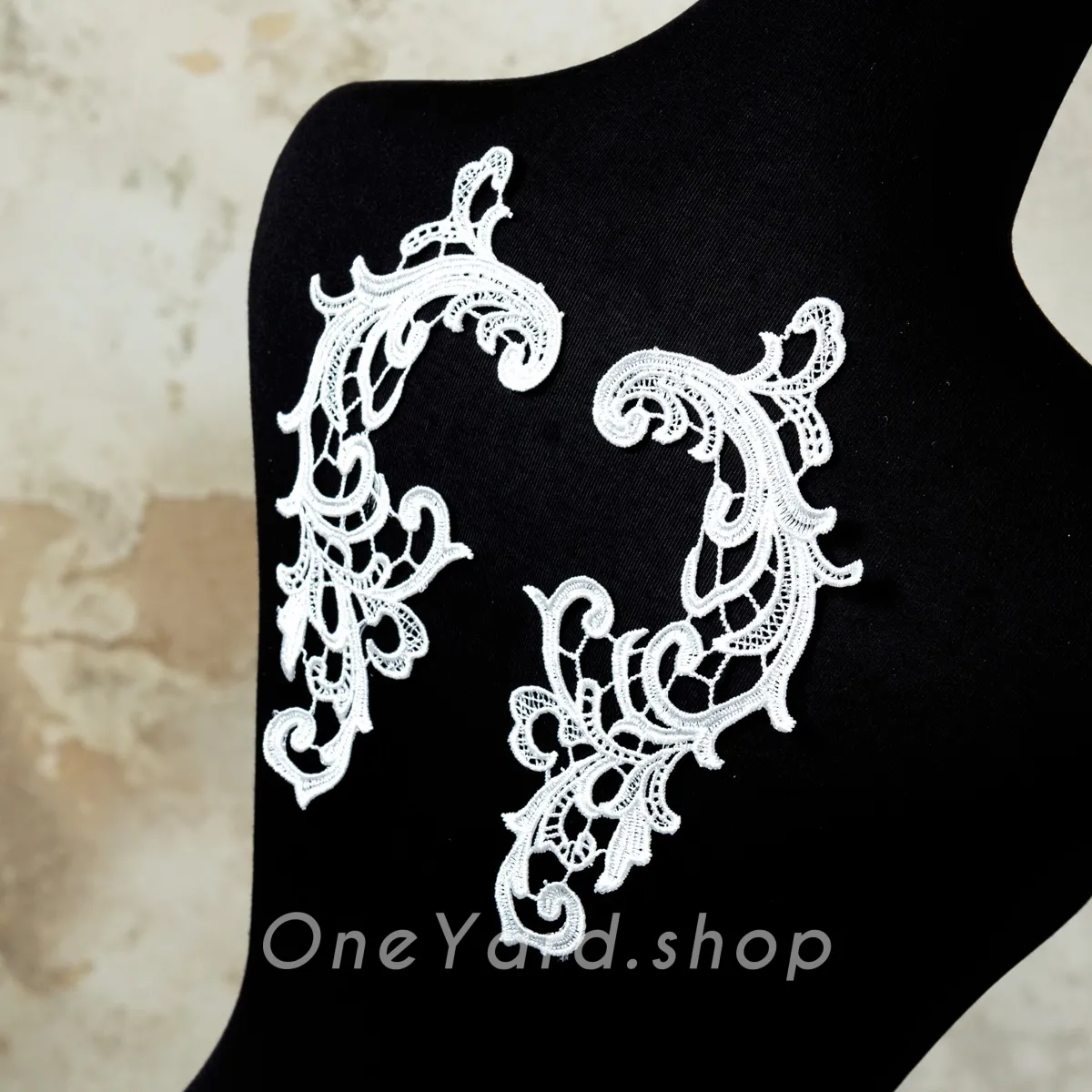 abstract pattern off white lace motifs