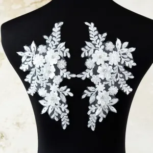 pair of white beaded lace motif for dresses