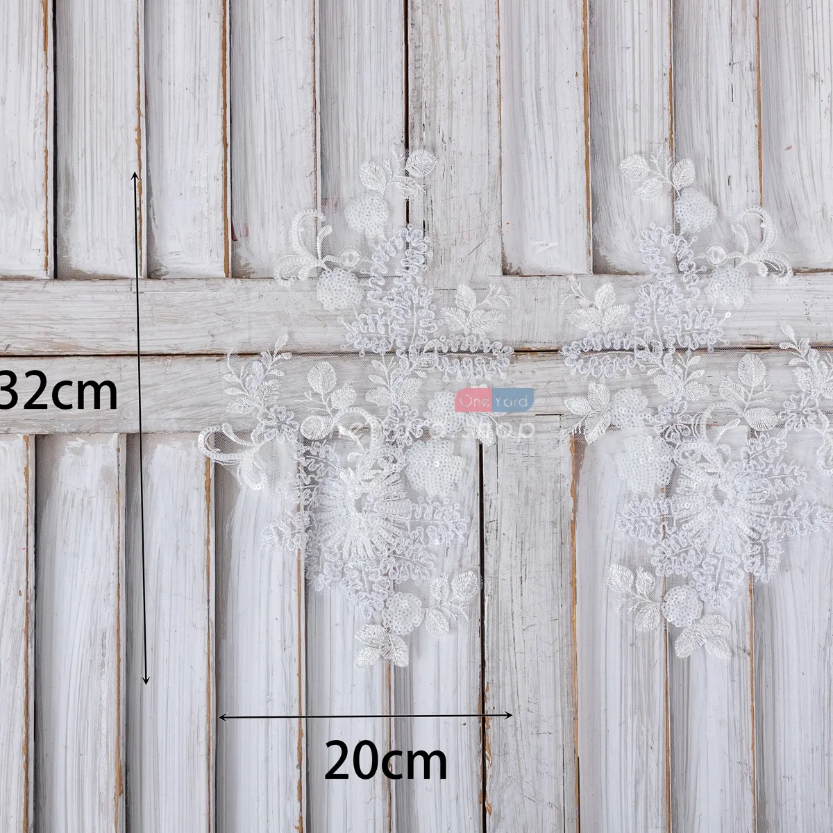 pair of white sequins and clear beads embellished ivory lace floral appliques