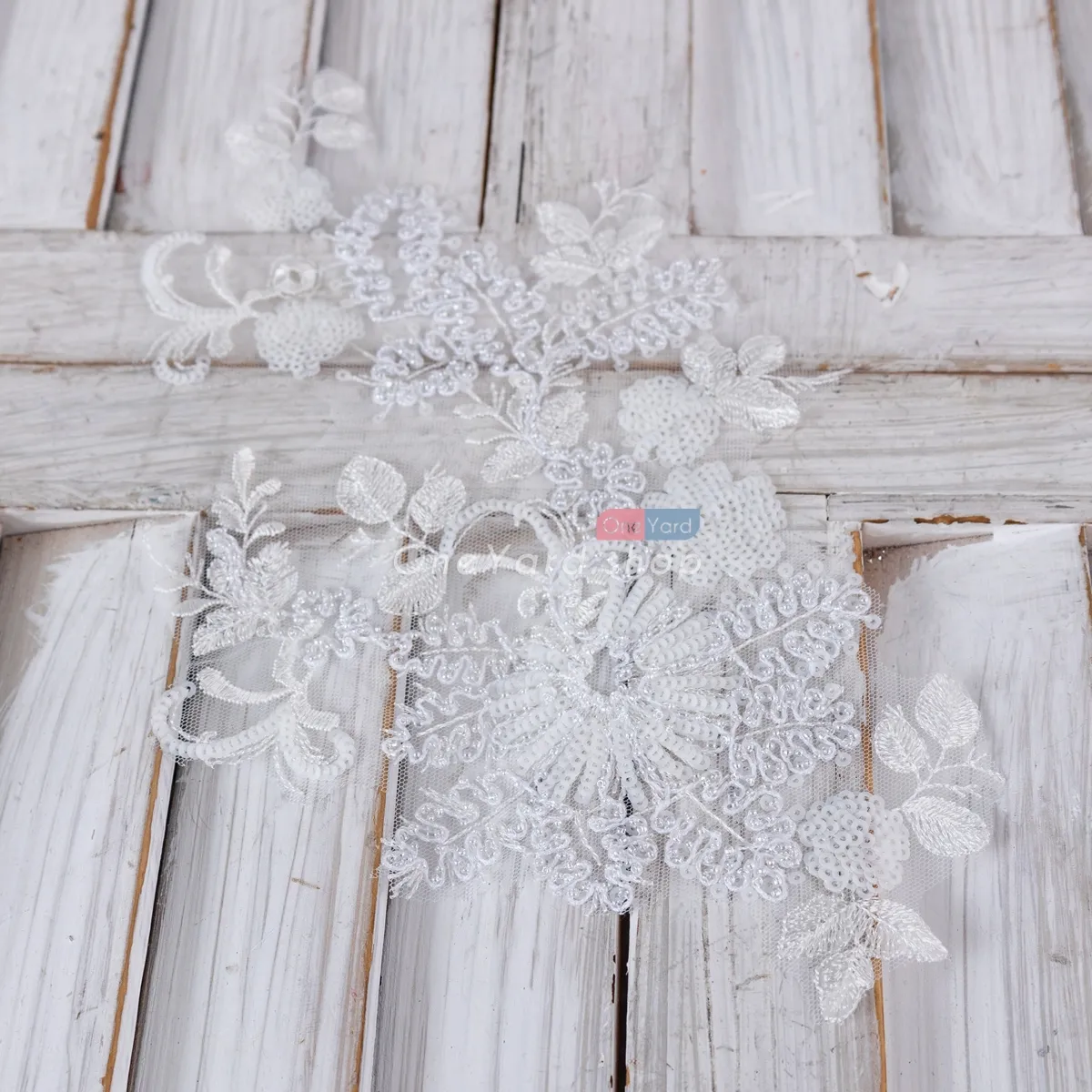 shiny beaded sequined ivory floral lace motif
