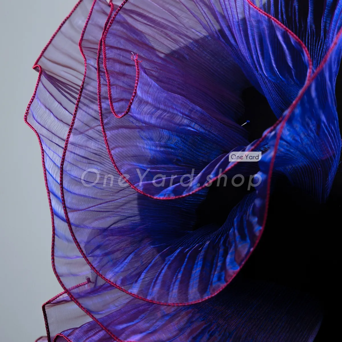 iridescent magenta and blue pleated organza trim