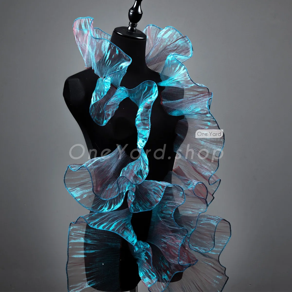 iridescent peacock blue and ruby organza trim for costumes