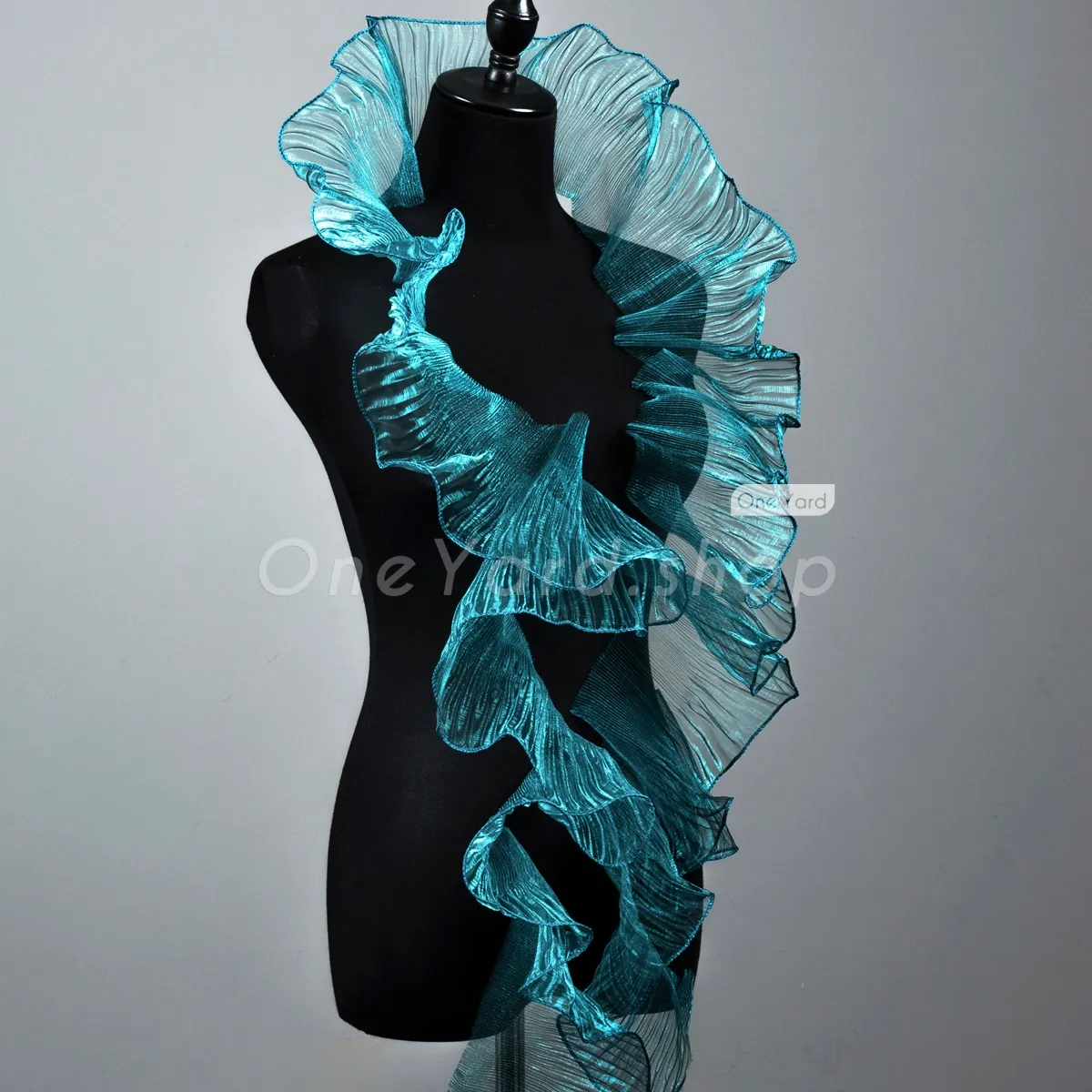 shimmering sheer pleated peacock blue organza trim