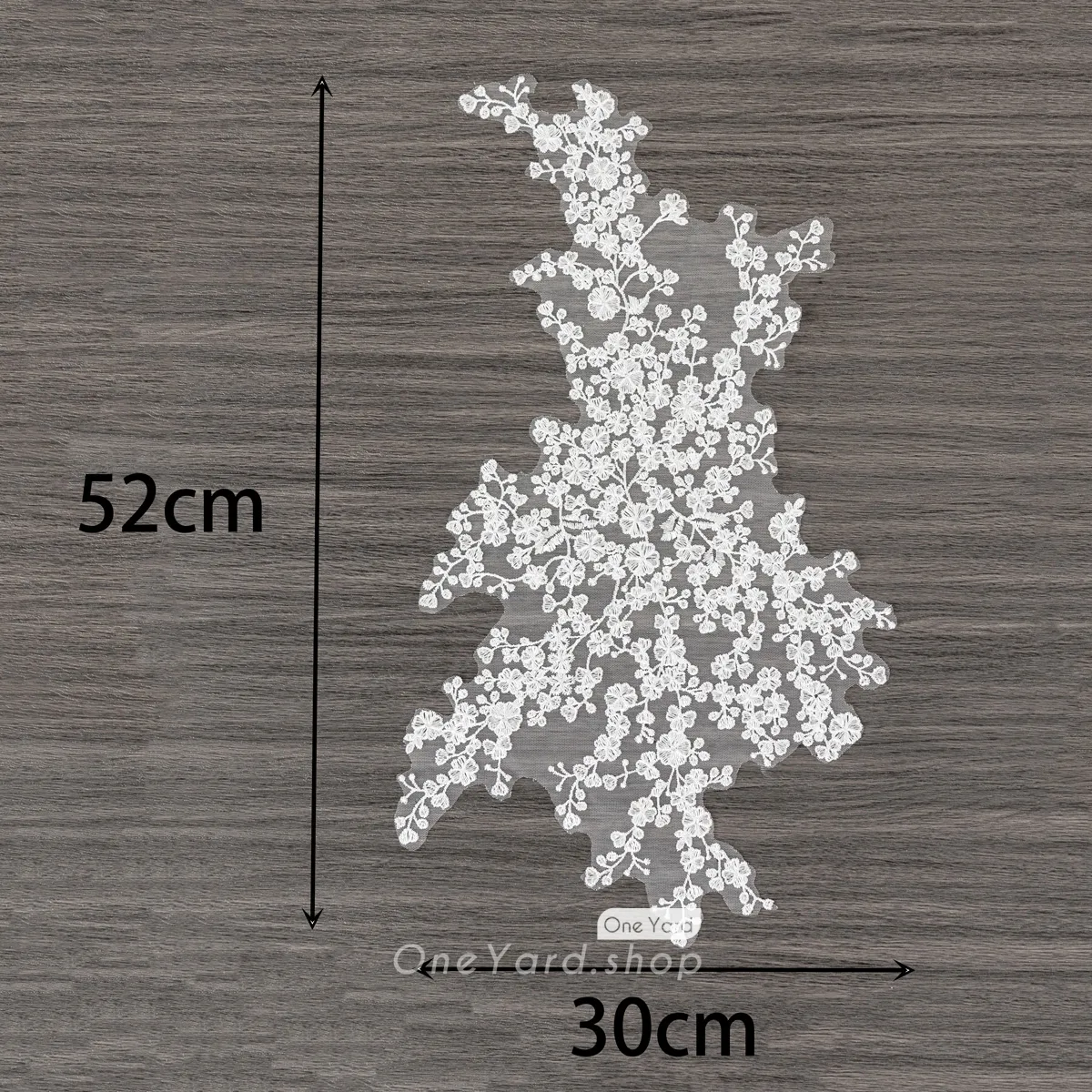 a piece of beautiful off white embroidered plum blossom lace applique