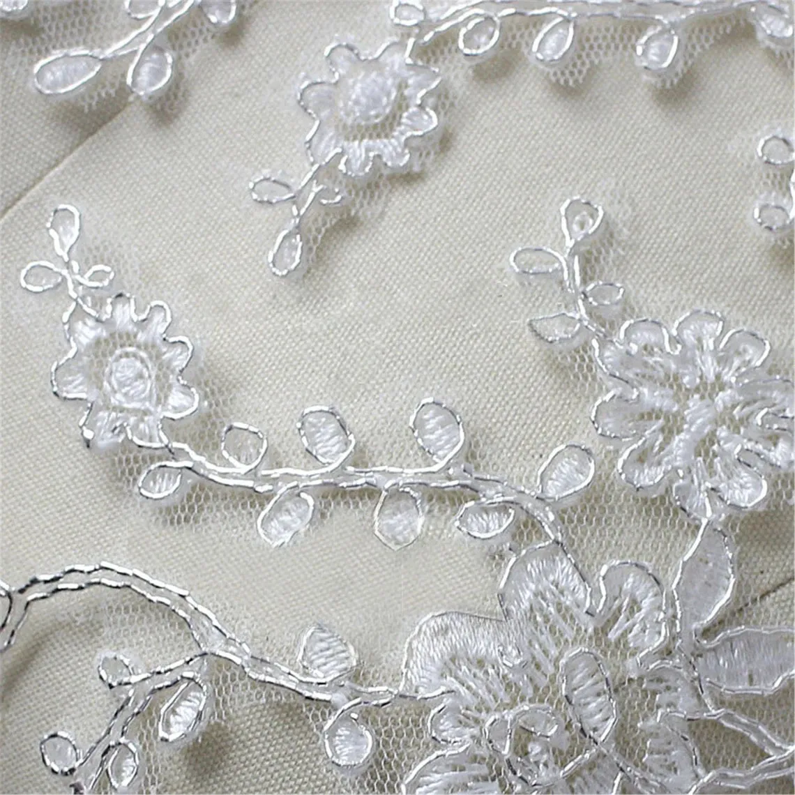 floral lace applique with silver boning