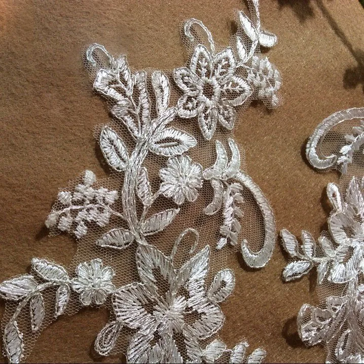 silver edged lace applique