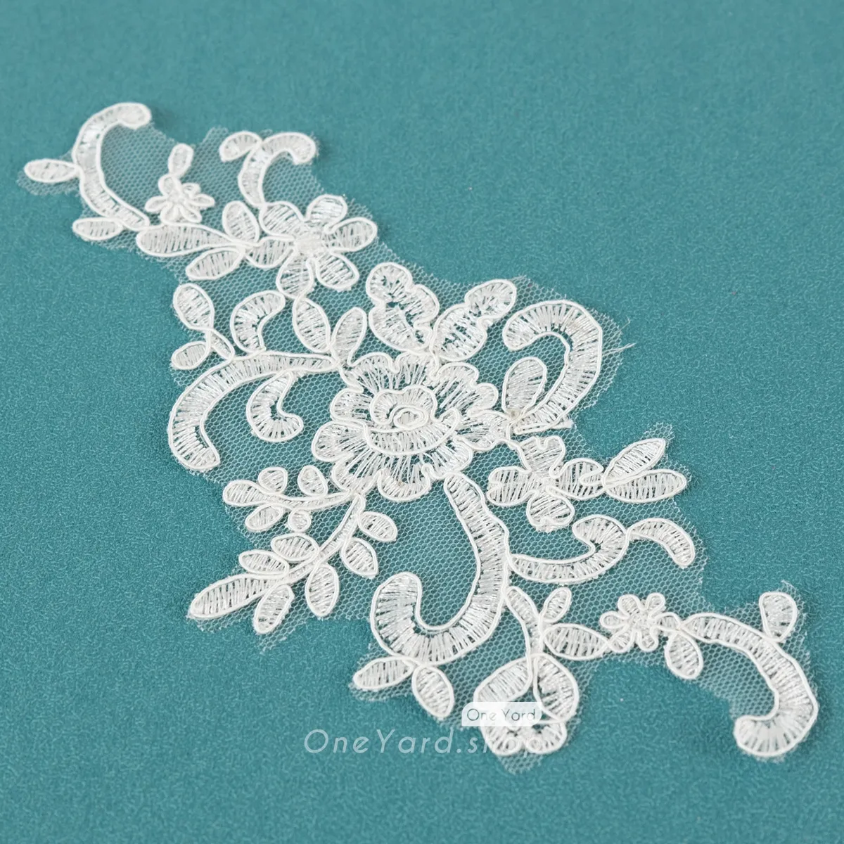ivory polyester corded floral lace embellishment