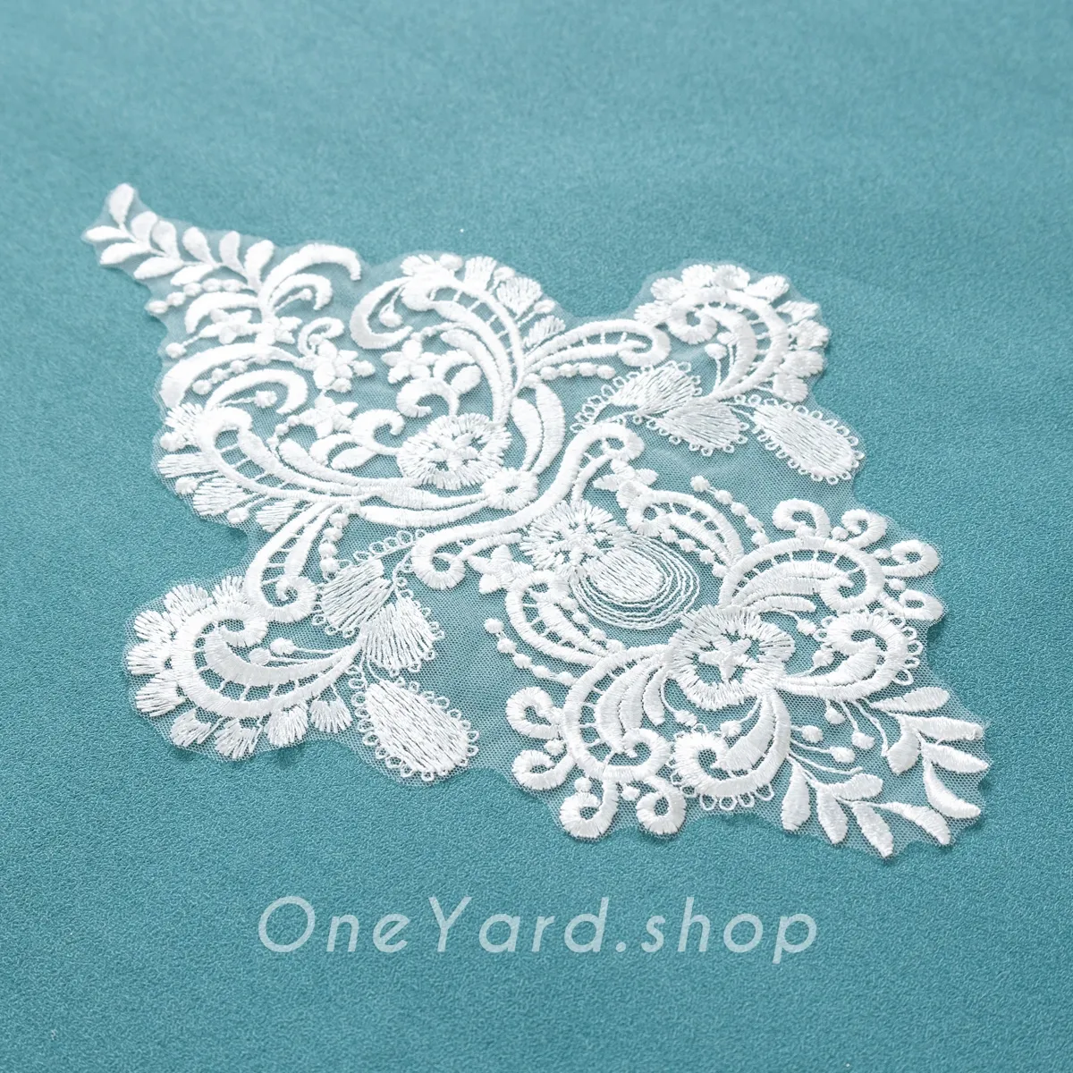 exquisitely detailed off white lace applique