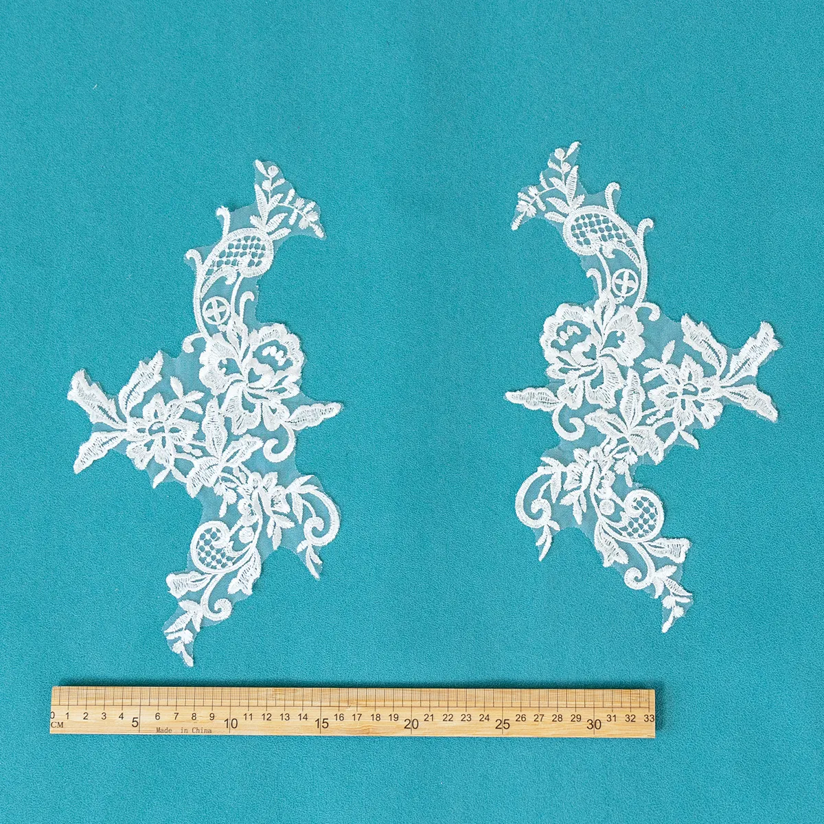 floral scroll lace mirror image motifs