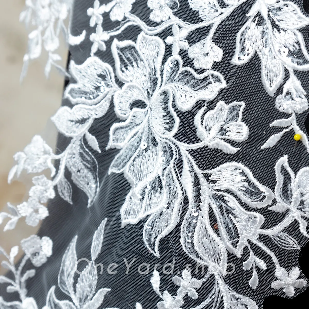 clear sequinned floral pattern off white lace applique