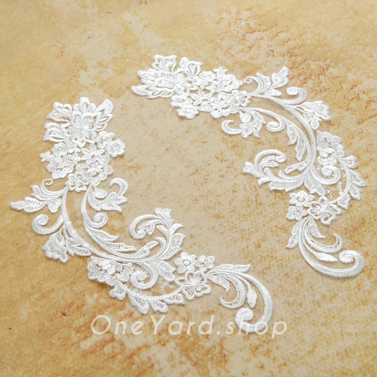mirrored lace motifs for framing bridal necklines mirrored lace motifs for framing bridal necklines