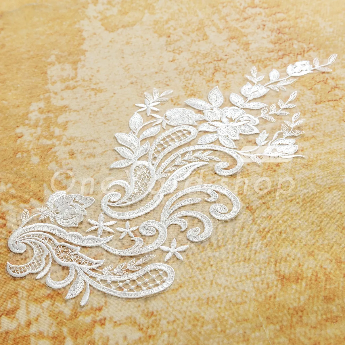 ornate paisley inspired scrollwork floral applique