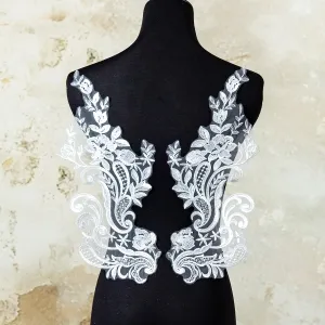 pair of clear sequinned white swirl floral lace appliques