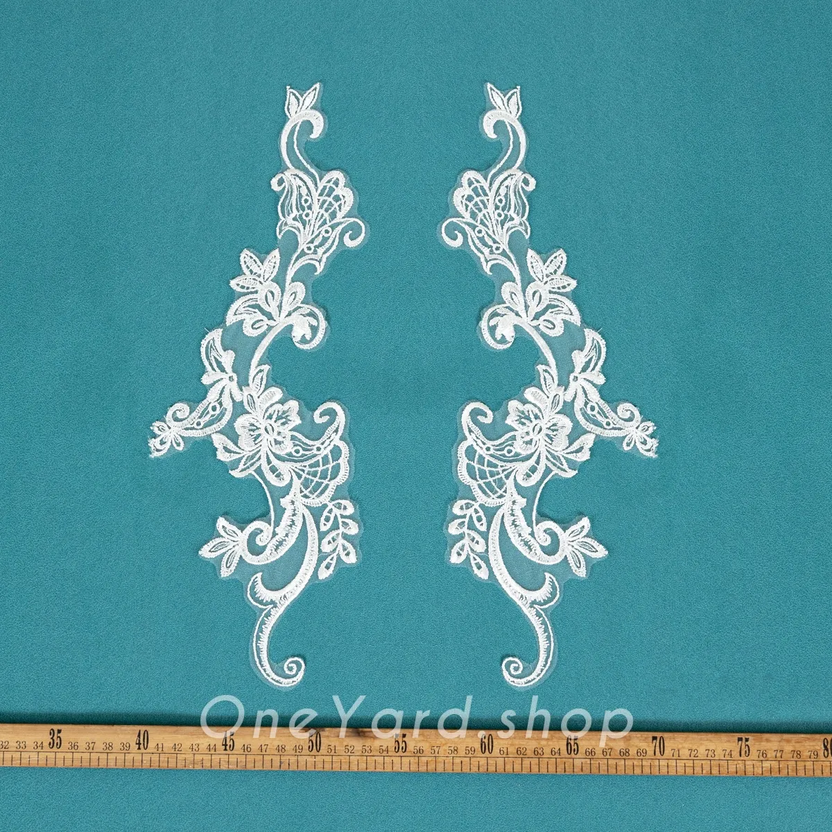 sequinned abstract lace appliques