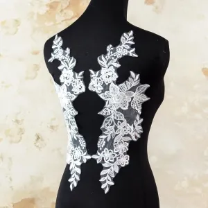 sequinned off white embroidered floral lace motifs