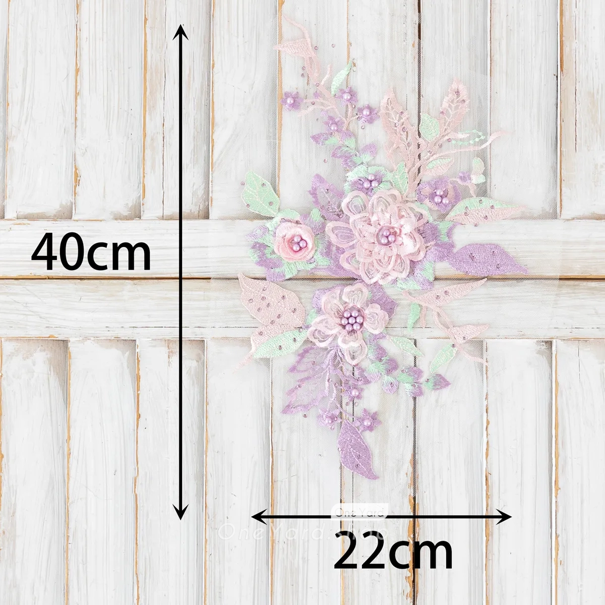 intricate beaded purple and green 3D flower applique