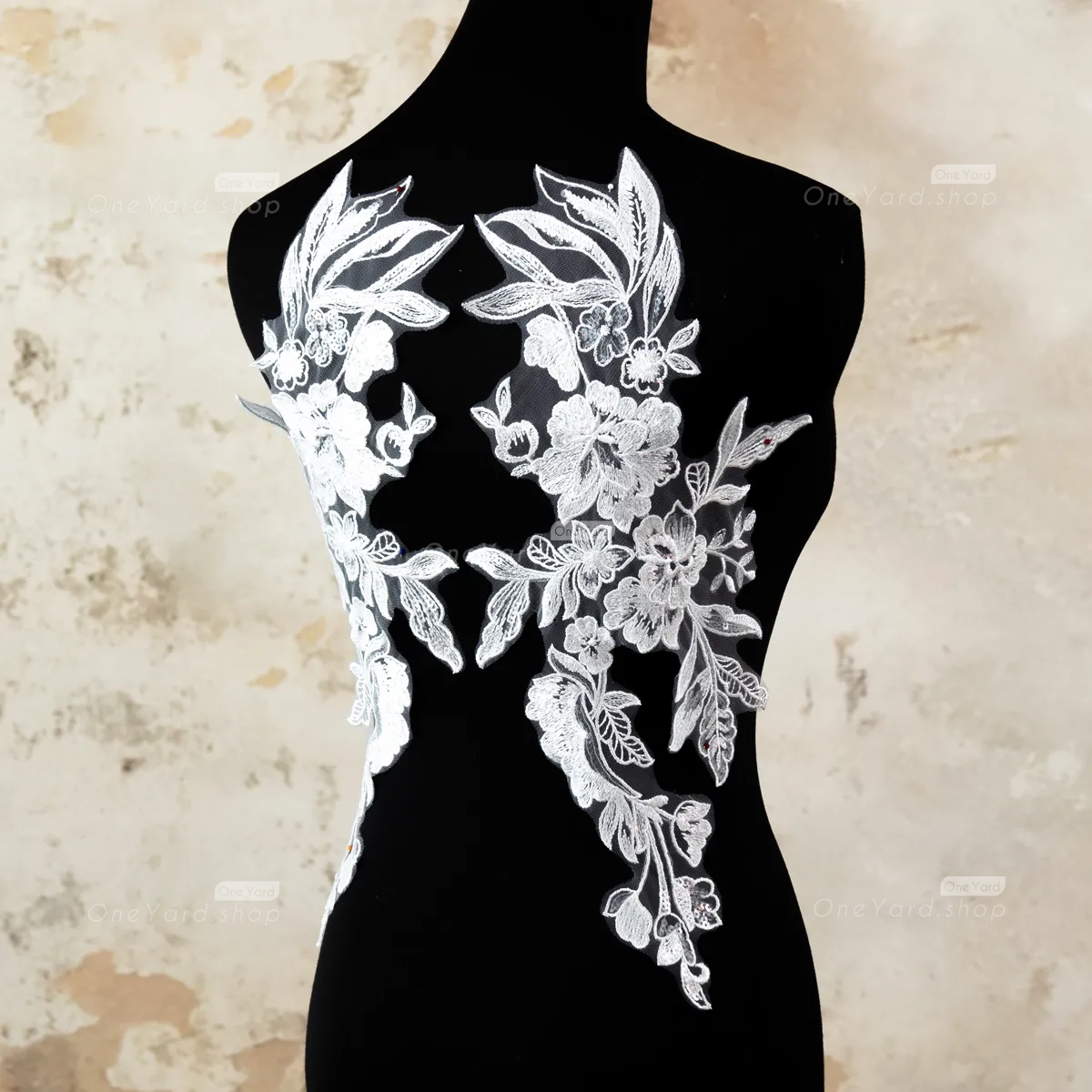 sequinned floral off white lace motifs