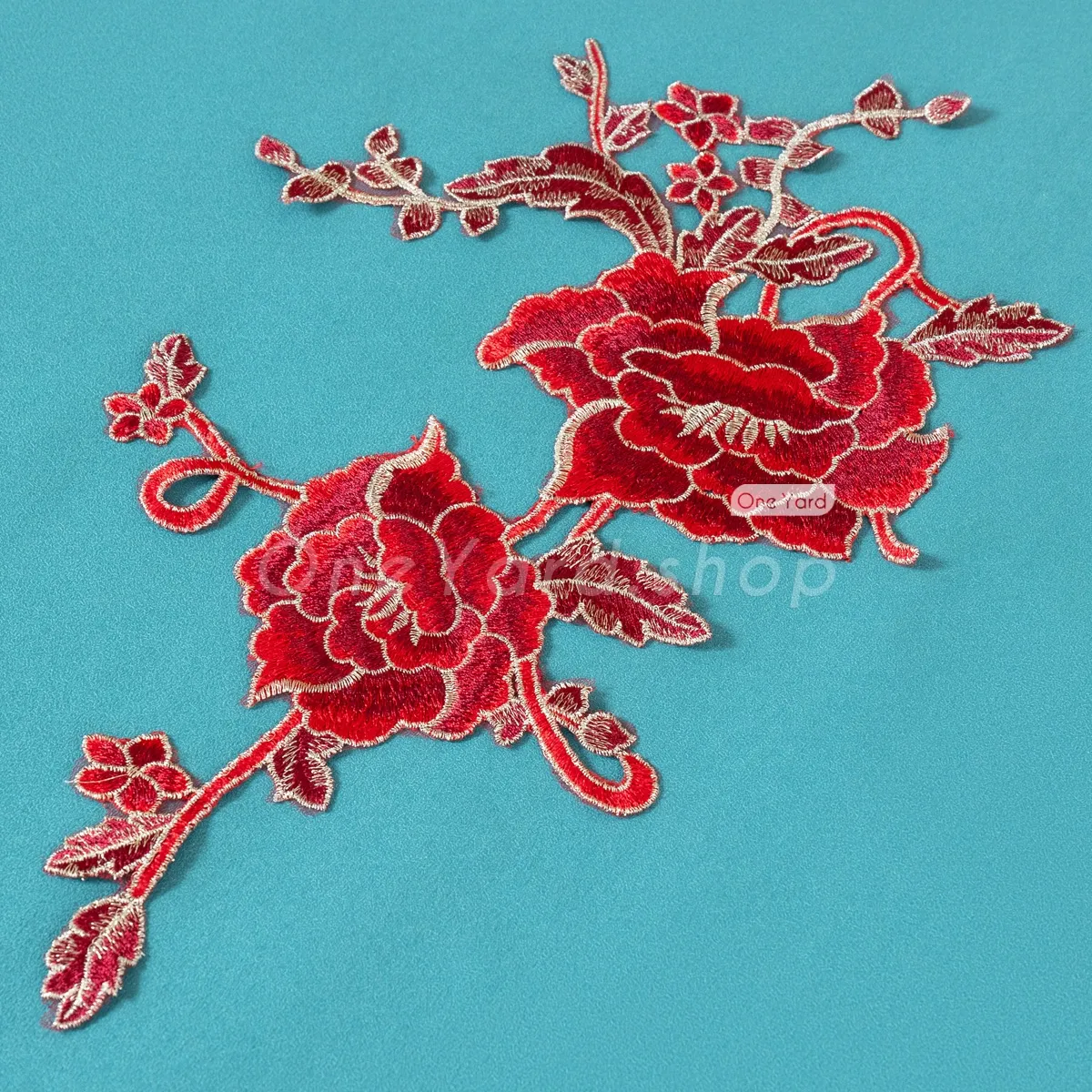 dark red lace flower with gold edges