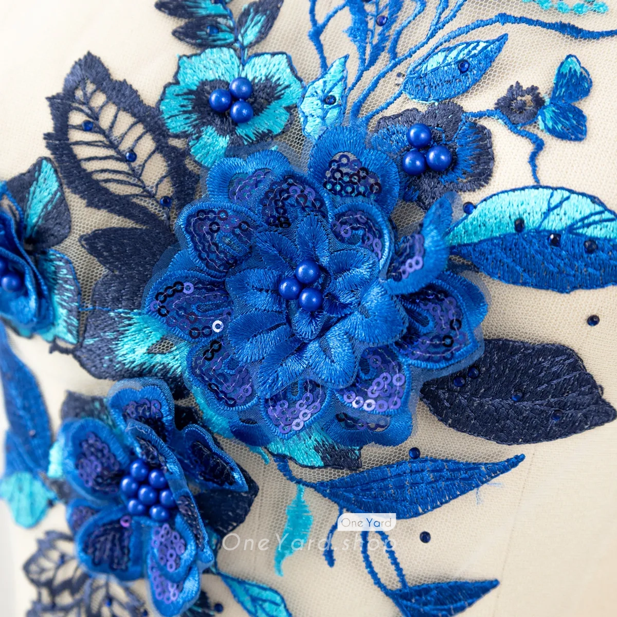 pearled beaded sequinned blue flower applique