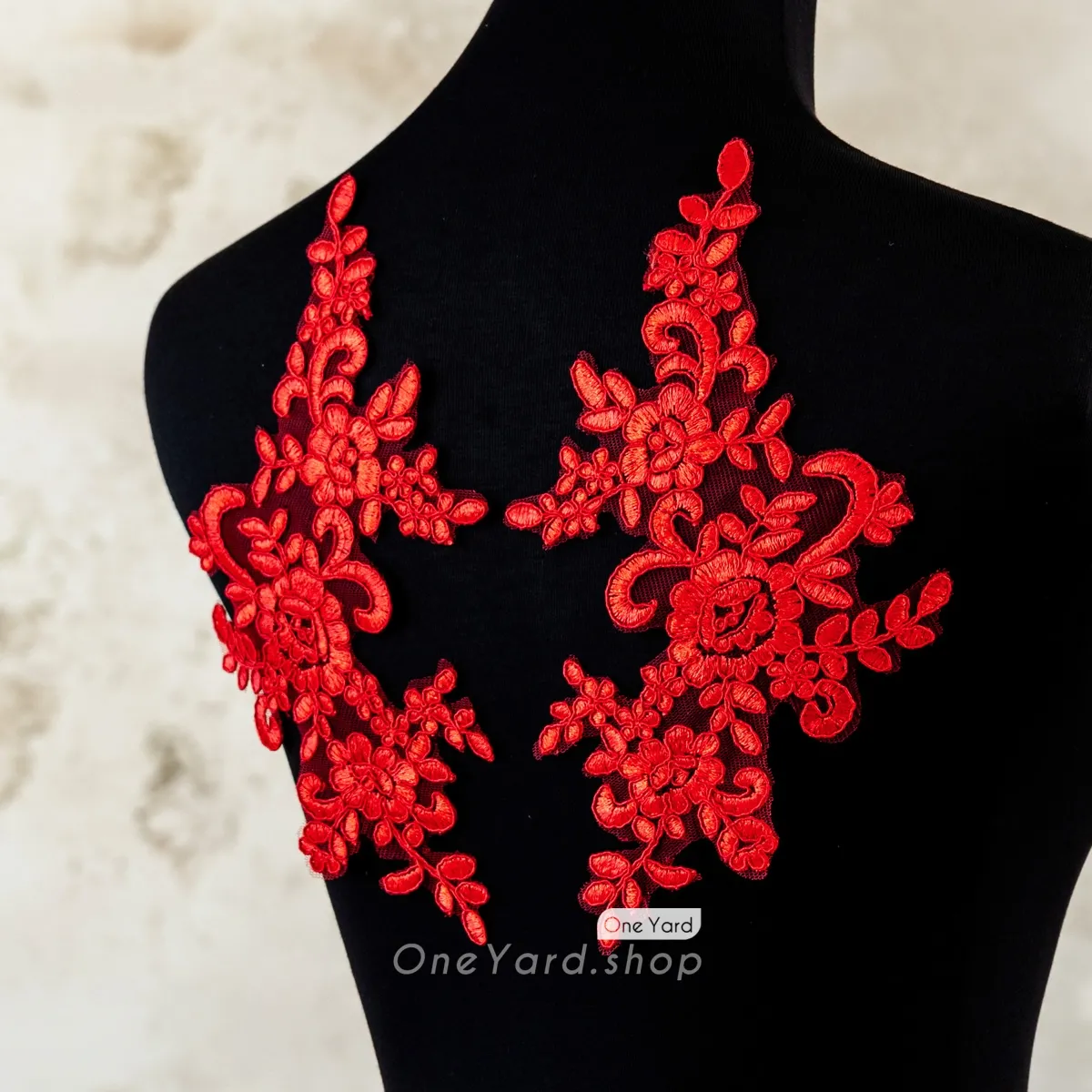 mirrored pair red floral motif corded lace applique