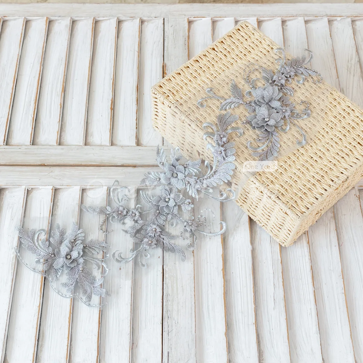this gray lace applique is a stunning set of wearable art