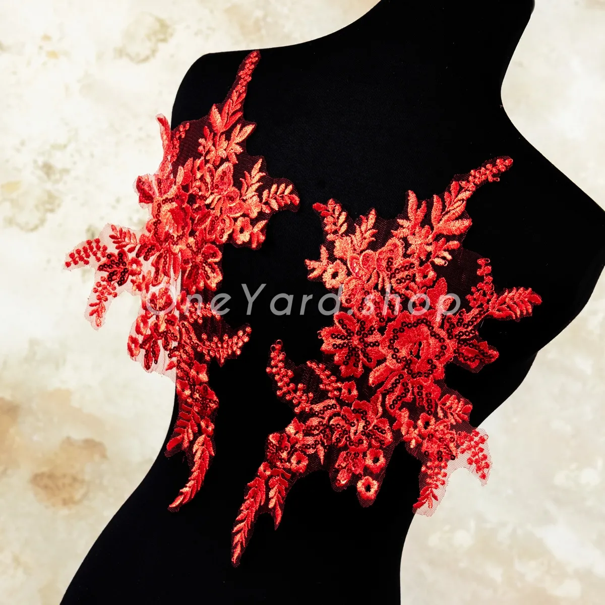 red sequinned floral lace applique pair