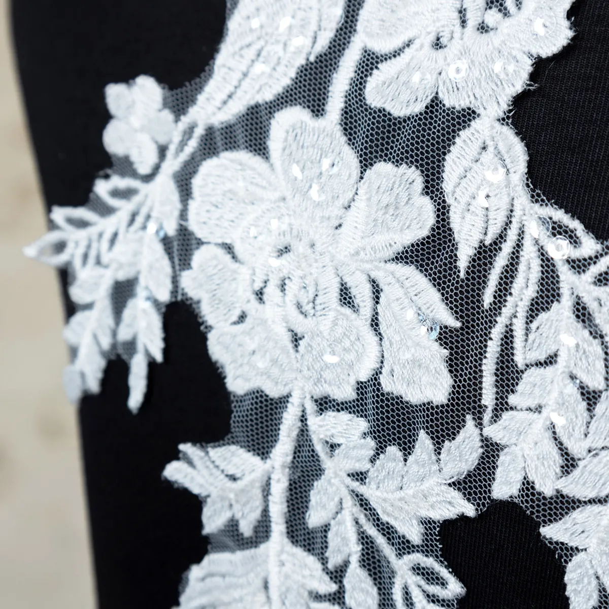 sequinned white cotton lace applique