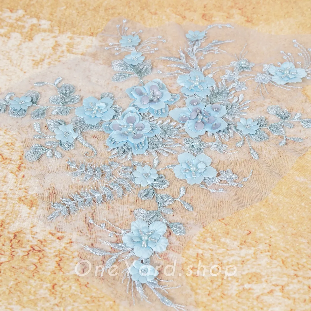baby blue beaded embroidered flowers and leaves