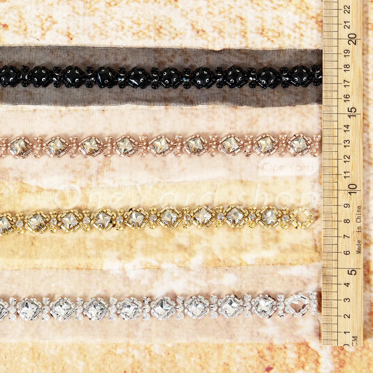 beaded rhinestone trim on sheer mesh for sparkling necklines