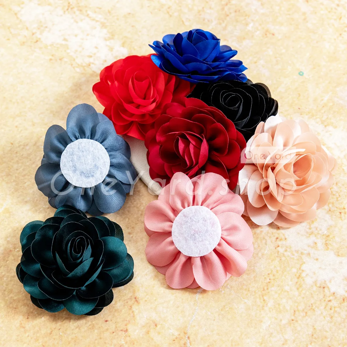 multiple layers of lustrous fabric 3D flowers multiple layers of lustrous fabric 3D flowers